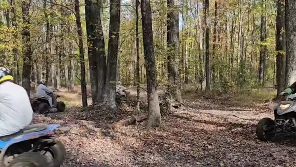 ATV group riding through the woods at NJ ATV Rentals