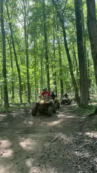 Smiling riders on an NJ ATV tour at NJ ATV Rentals
