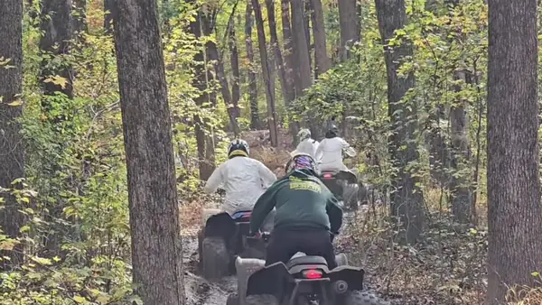 Smiling riders on an NJ ATV tour at NJ ATV Rentals